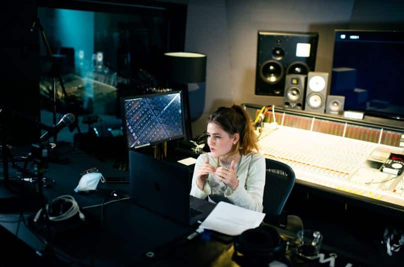 Female student sitting down at desk