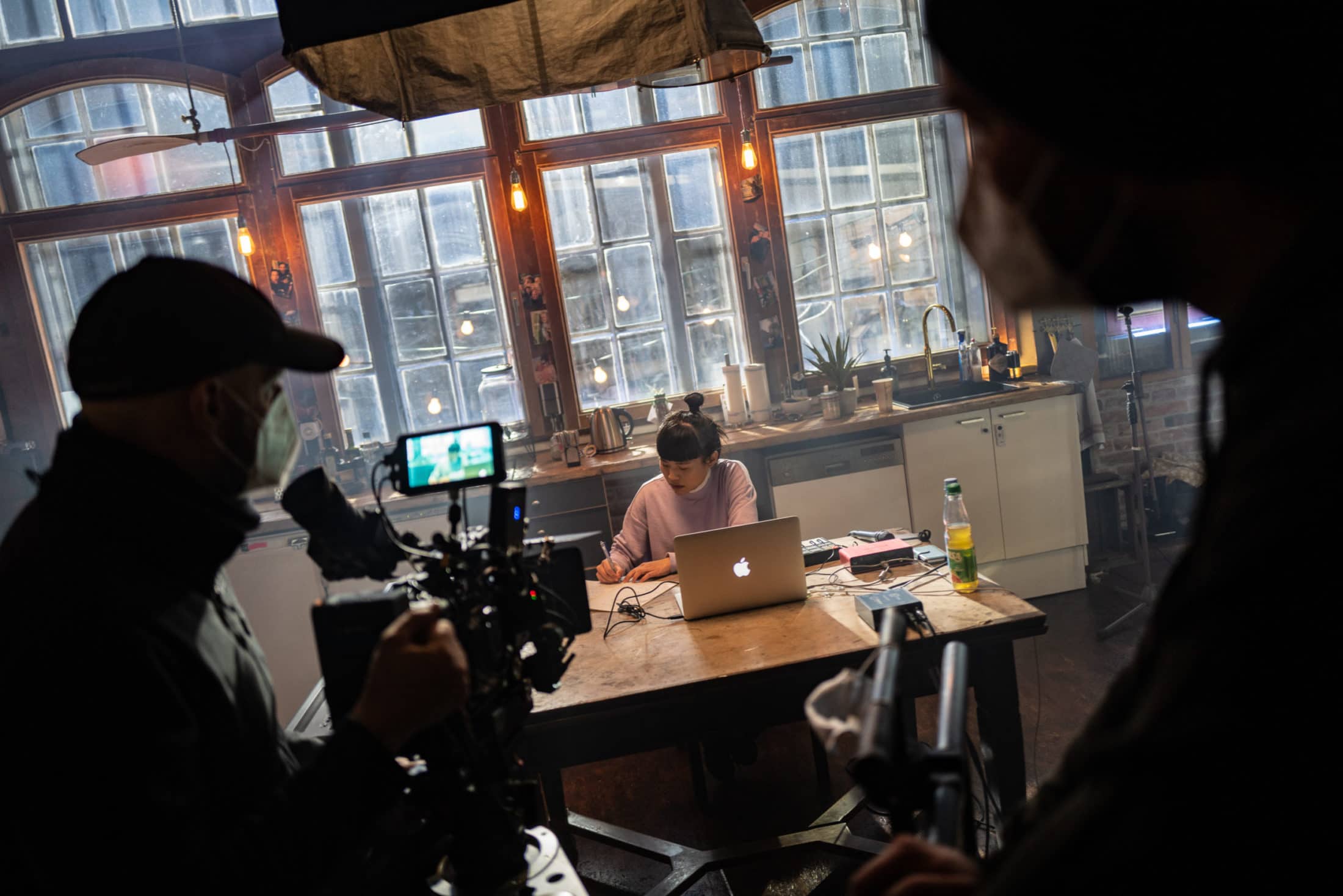 Ngoc Anh Nguyen sitting down while being recorded