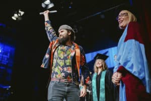 Students on stage at the BIMM Berlin graduation 2022