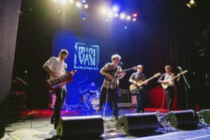 Mini Van on stag performing at the BIMM Berlin graduation 2022