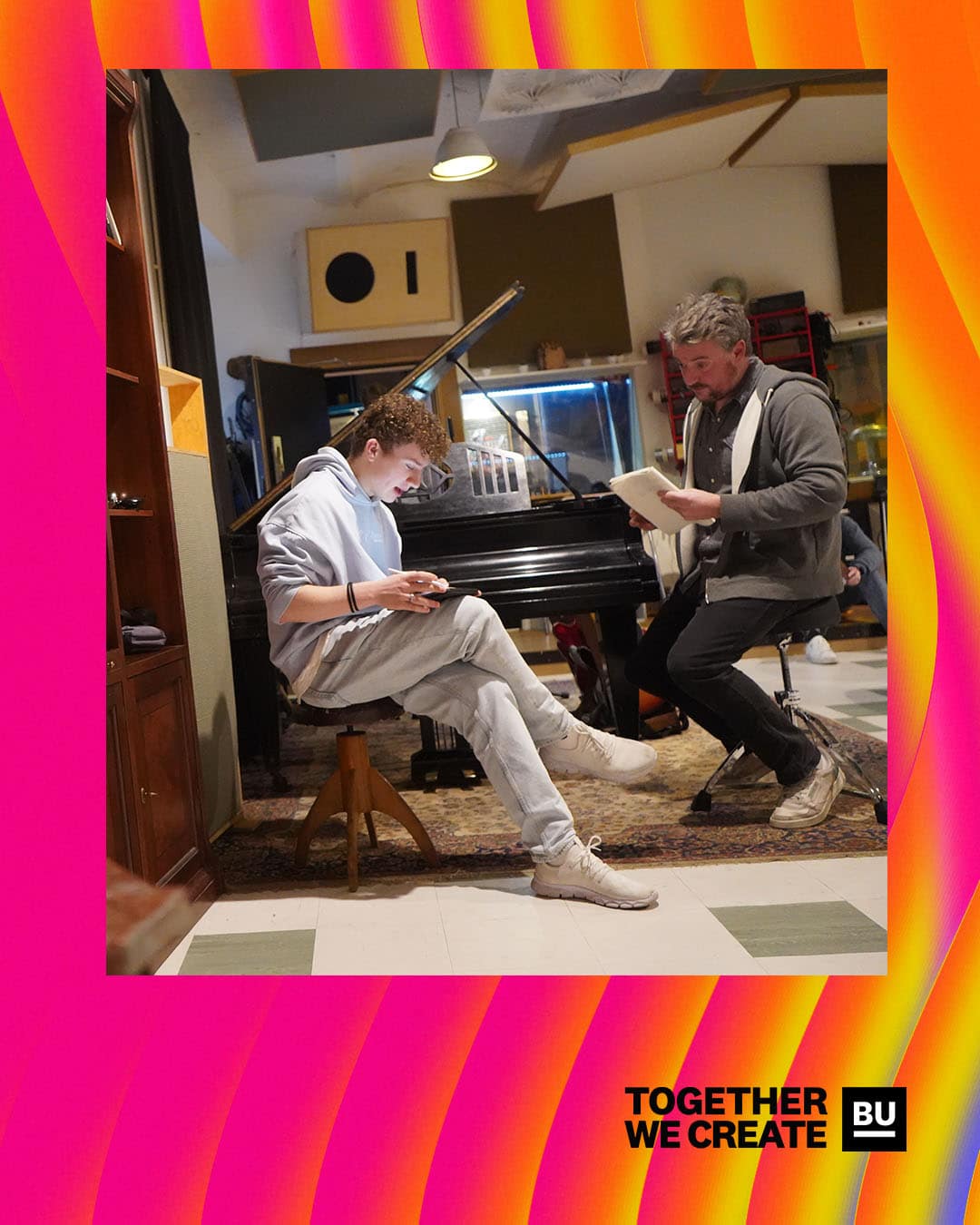 Image depicts a student and singer-songwriter Ryan O'Reilly sat at a piano in L.A. Recordings for the BIMM University Berlin Songwriting Seminar. In the bottom right-hand corner is the TOGETHER WE CREATE that captures collaboration across campuses in BIMM University.