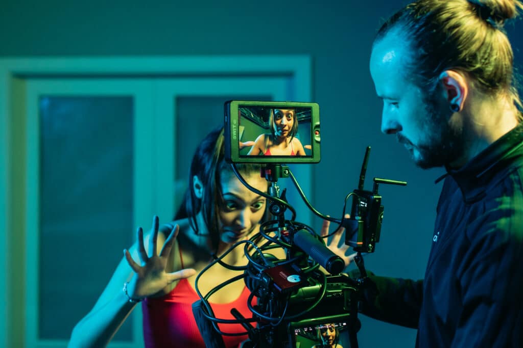 Students using a film camera