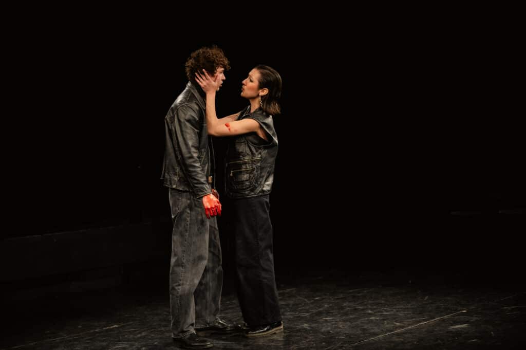 BIMM University Berlin students on stage in each others embrace.