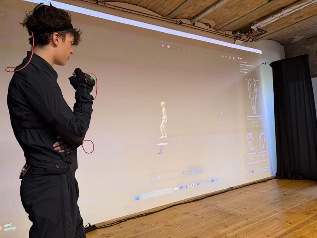 Student watches motion capture assessment